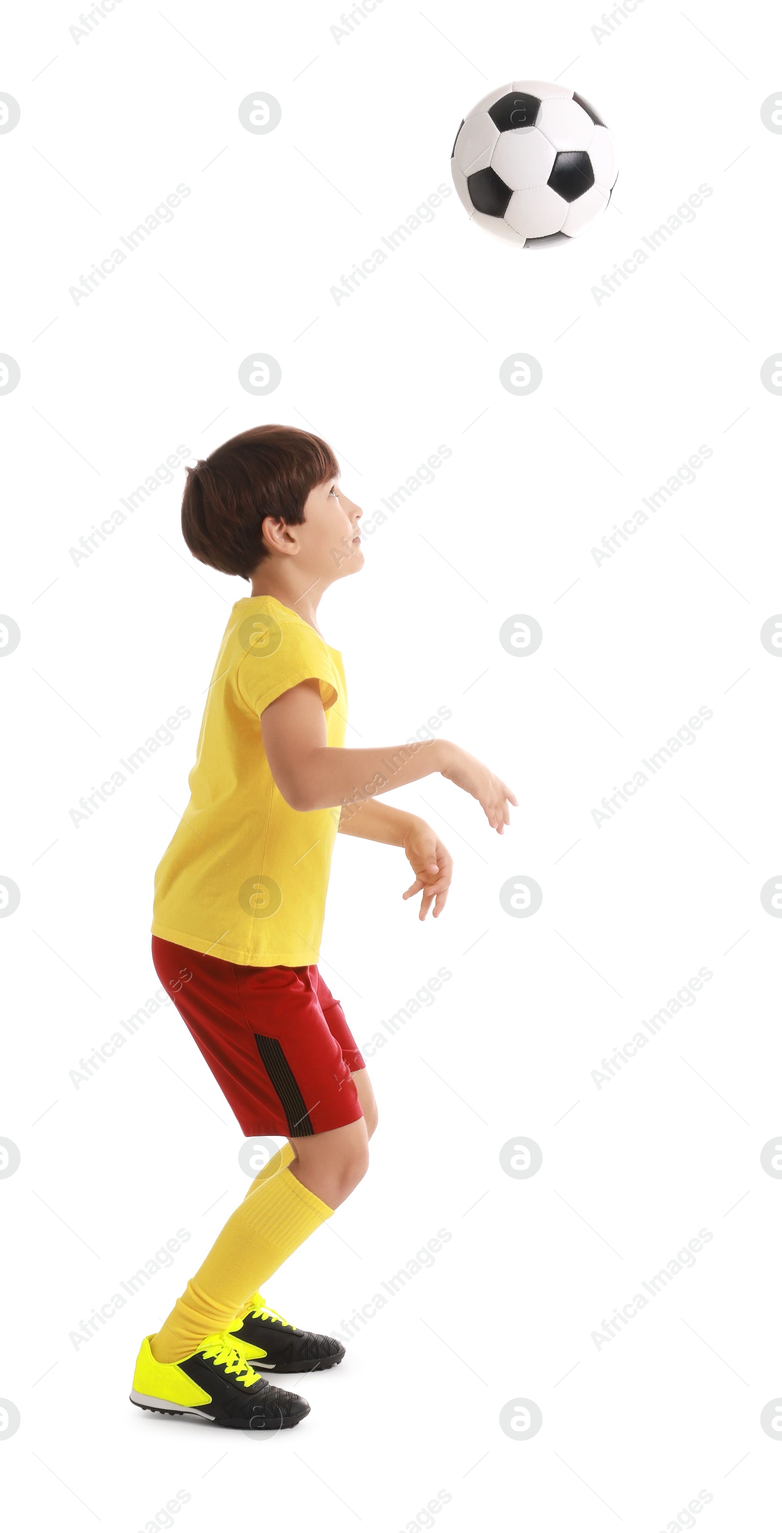 Photo of Boy with soccer ball playing football on white background