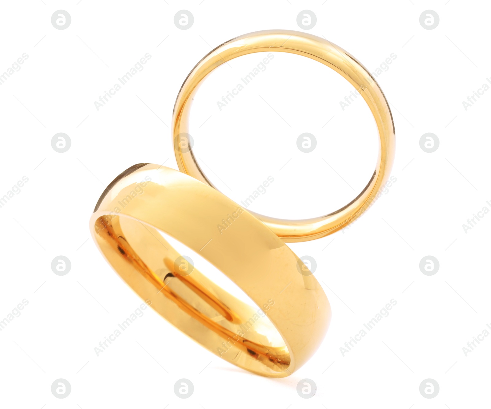 Photo of Beautiful golden wedding rings isolated on white