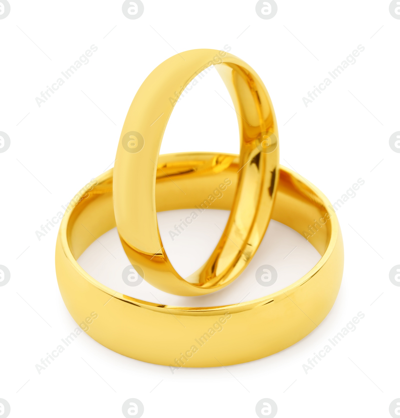 Photo of Beautiful golden wedding rings isolated on white