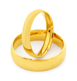 Photo of Beautiful golden wedding rings isolated on white