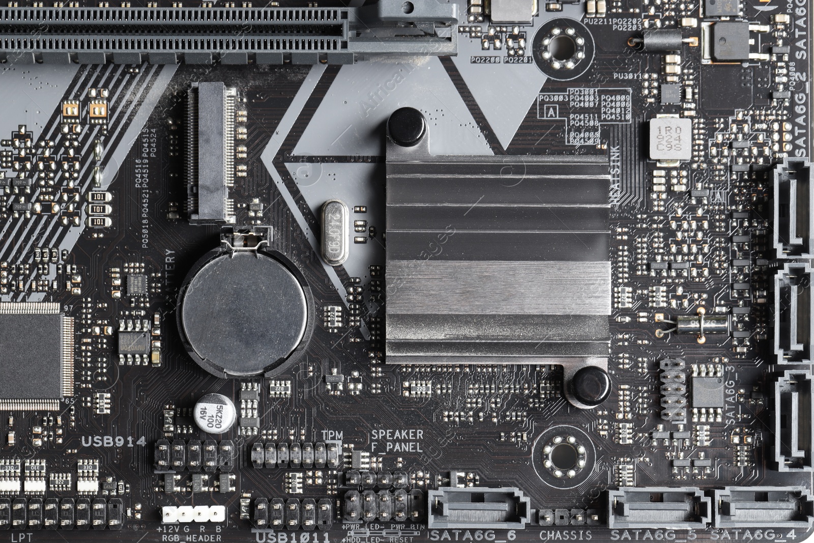 Photo of Computer motherboard as background, top view. Electronic engineering