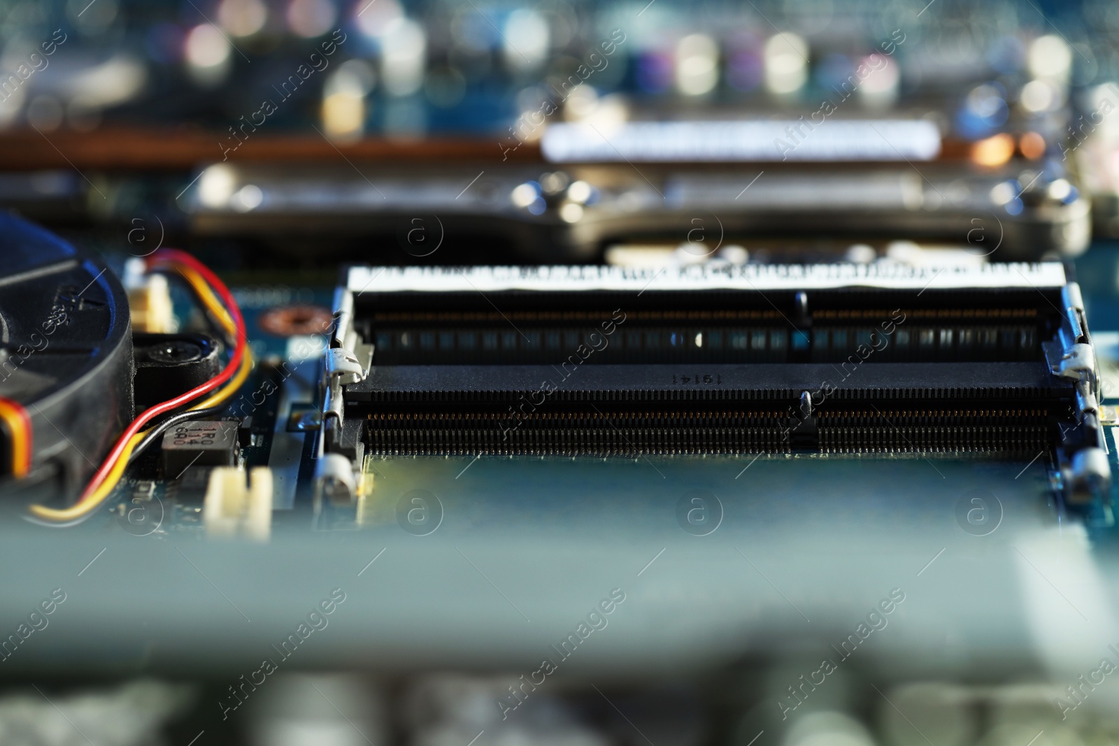 Photo of RAM slots in motherboard, macro view. Electronic engineering