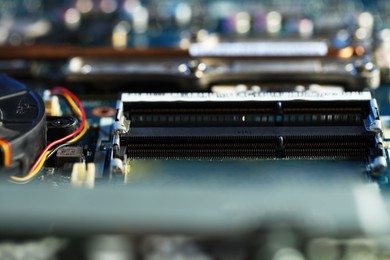 Photo of RAM slots in motherboard, macro view. Electronic engineering