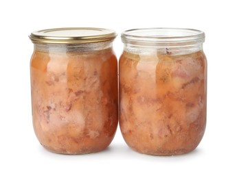 Photo of Canned meat in glass jars isolated on white