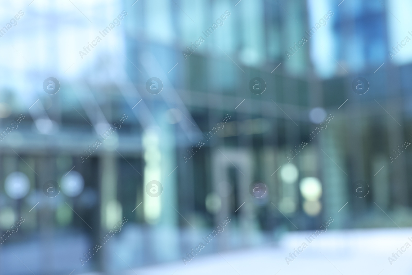 Photo of Blurred view of modern building with many windows outdoors