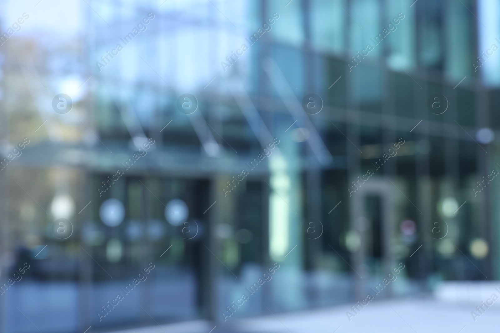 Photo of Blurred view of modern building with many windows outdoors