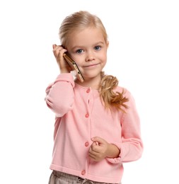 Cute little girl talking on smartphone against white background