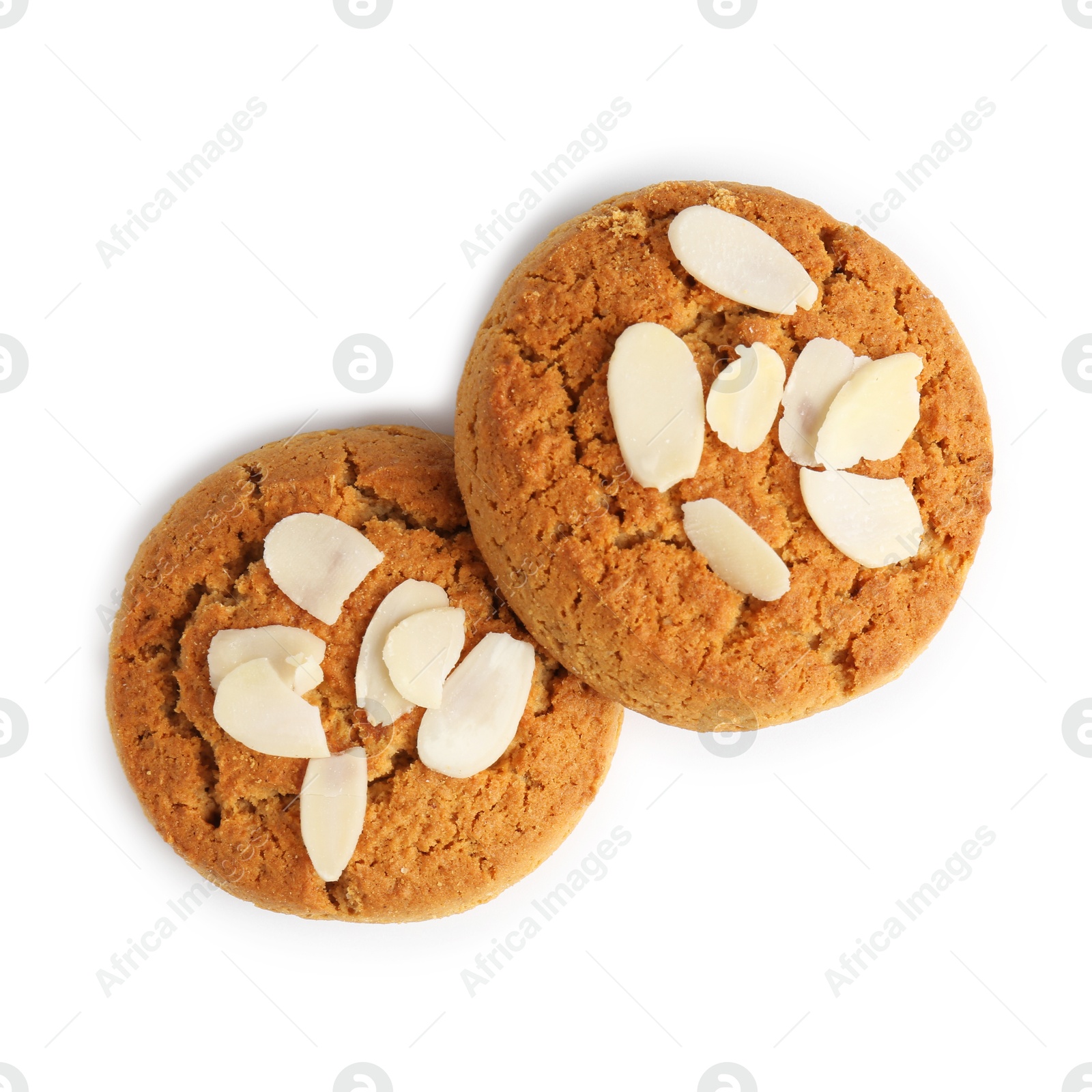 Photo of Tasty cookies with almond flakes isolated on white, top view