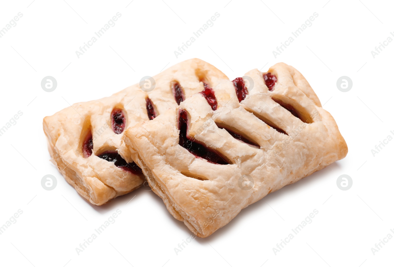 Photo of Delicious puff pastries with fruit filling isolated on white