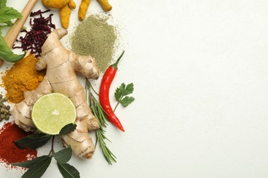 Different aromatic spices, lime and herbs on white background, flat lay. Space for text