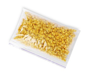 Photo of Frozen corn kernels in plastic bag isolated on white, top view