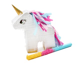 Photo of Colorful unicorn shaped pinata and stick isolated on white