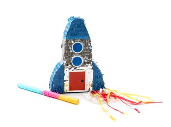 Photo of Rocket shaped pinata and stick isolated on white