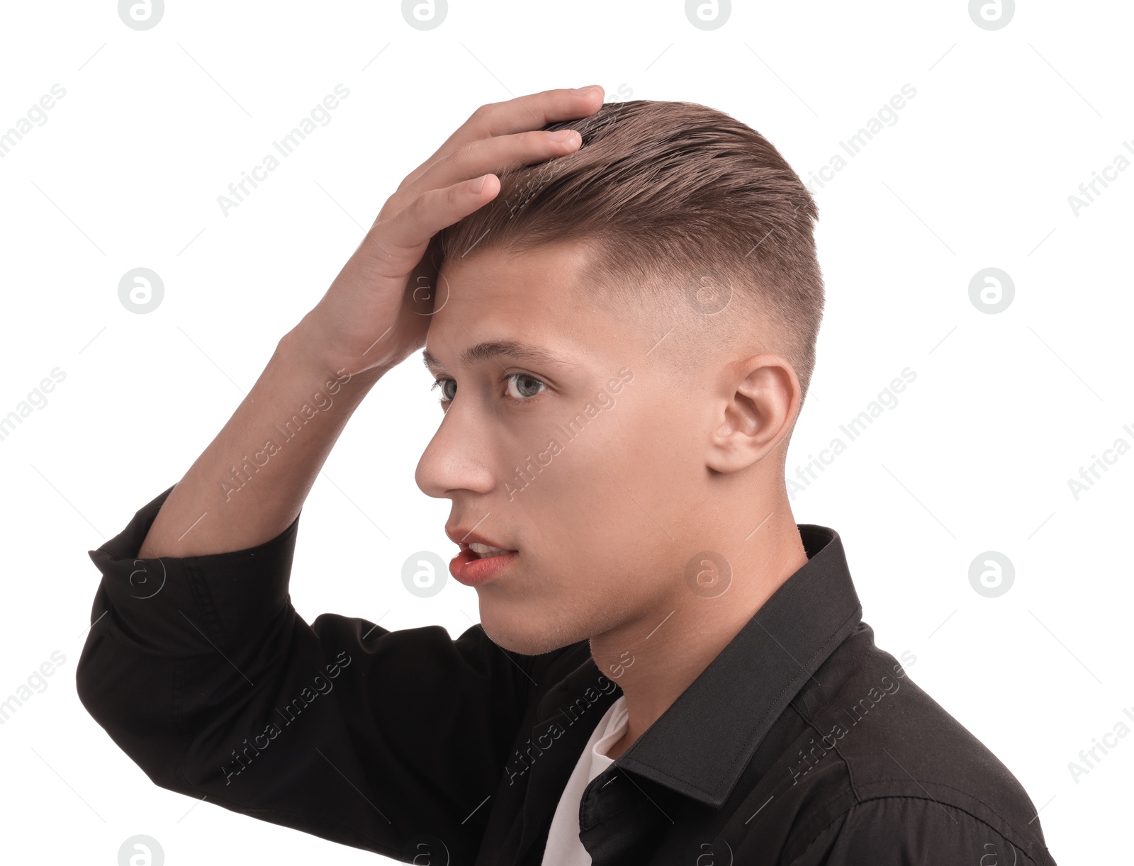 Photo of Confident young man with stylish haircut on white background