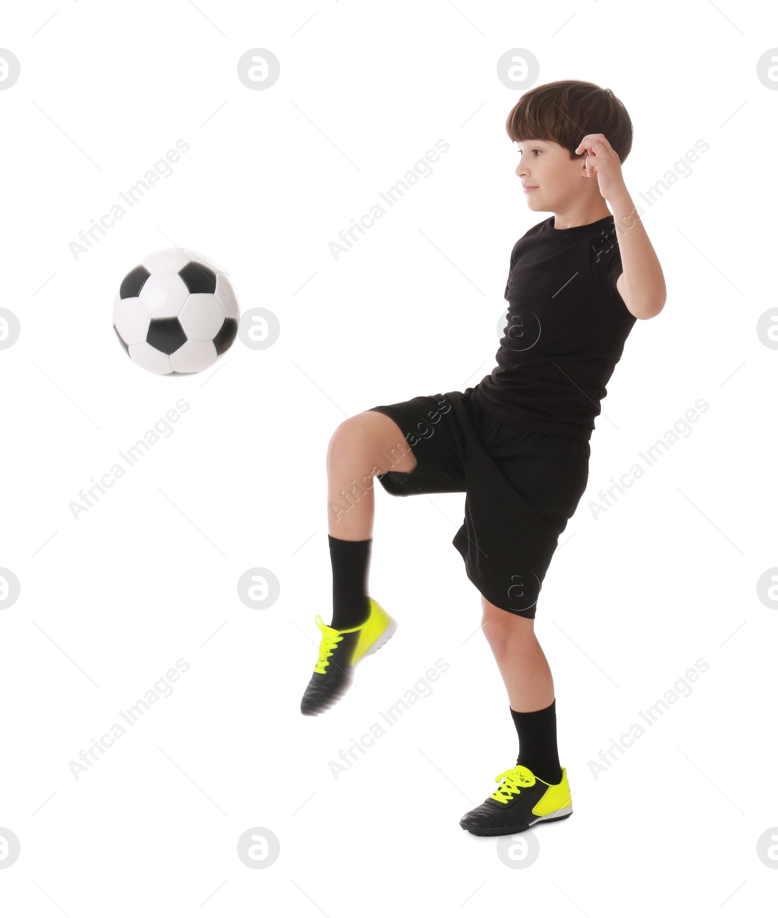 Photo of Boy with soccer ball playing football on white background