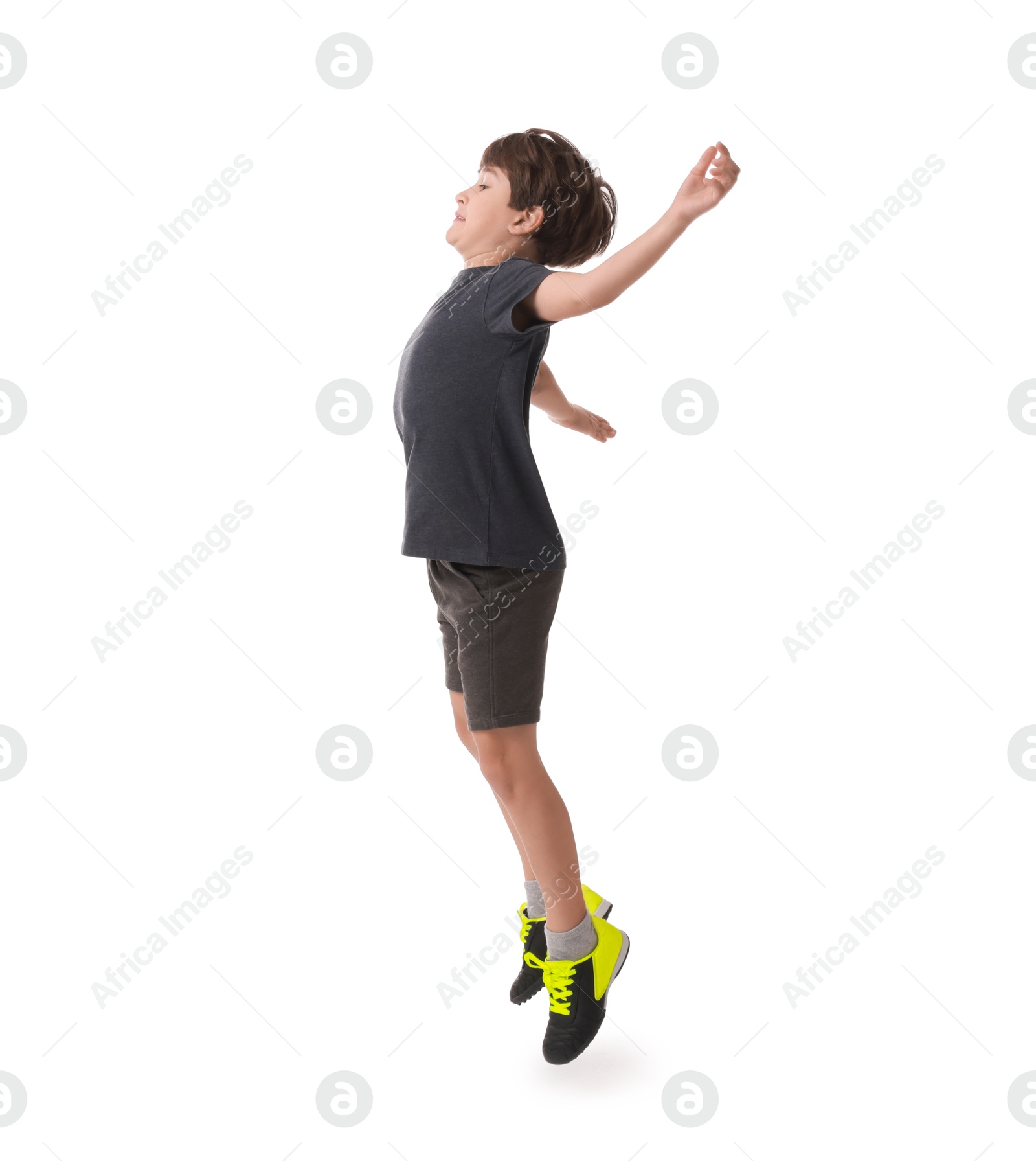 Photo of Boy with soccer ball playing football on white background