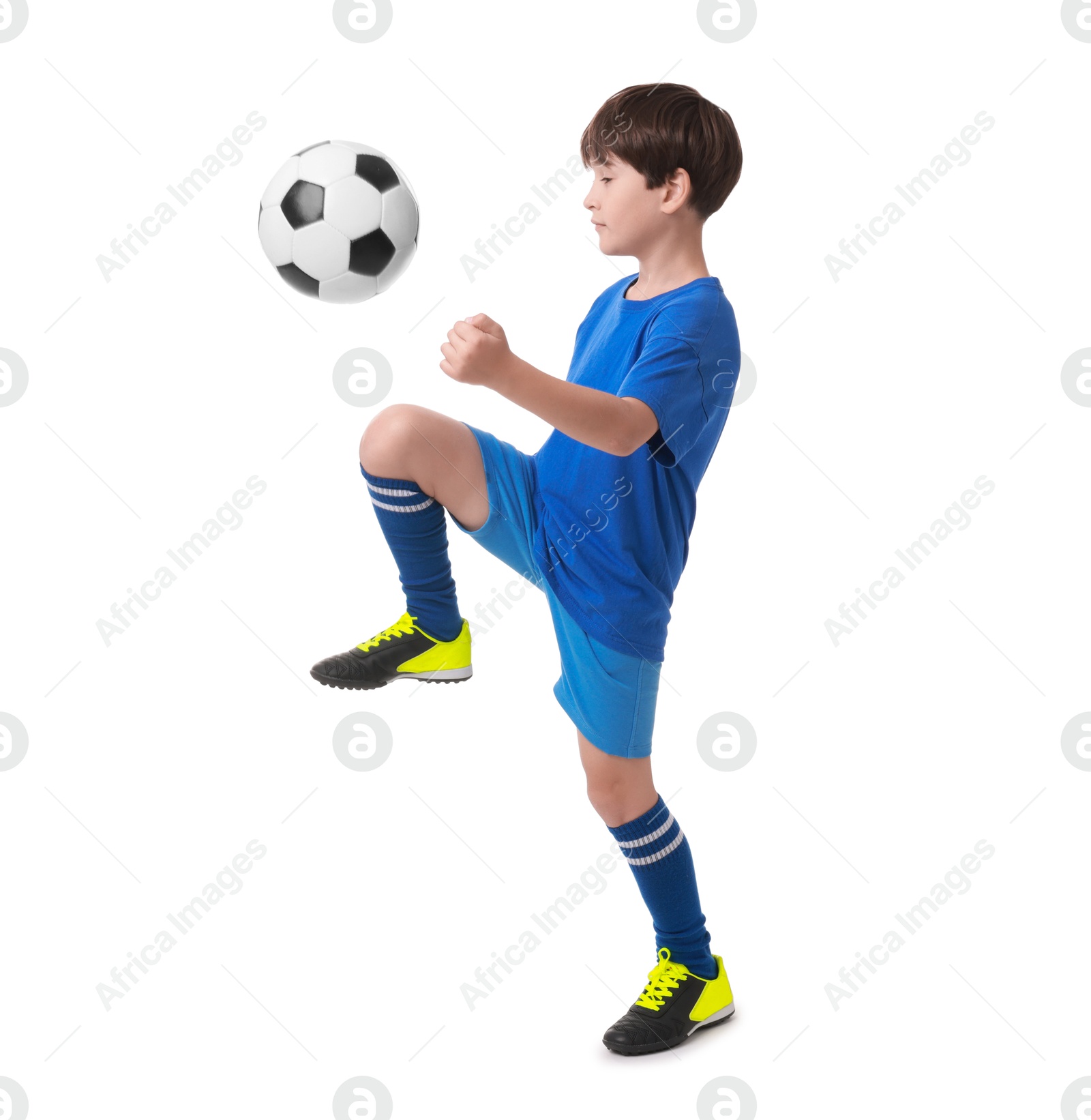 Photo of Boy with soccer ball playing football on white background