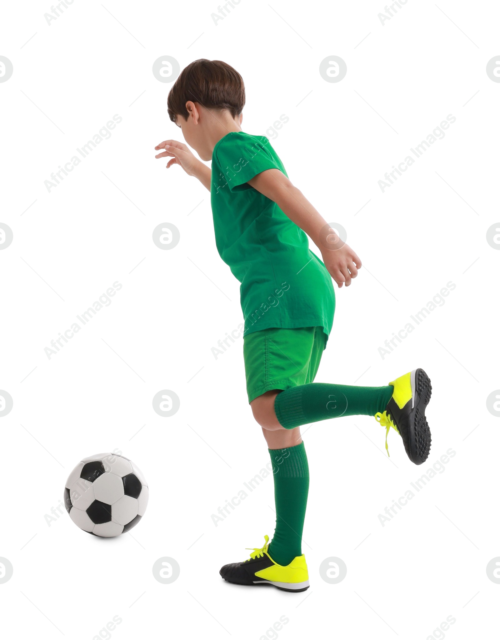 Photo of Boy with soccer ball playing football on white background