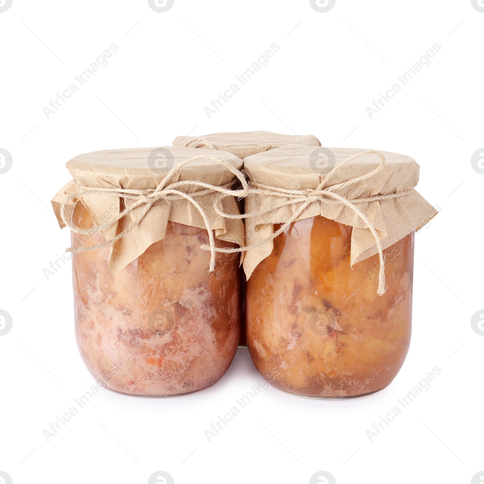 Photo of Canned meat in glass jars isolated on white