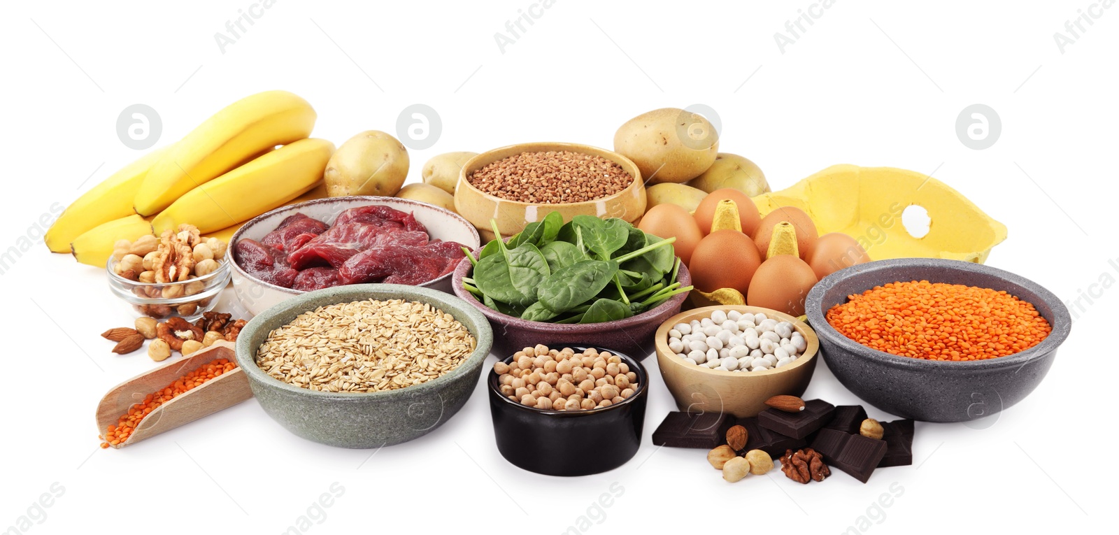 Photo of Different products rich in iron on white background. Anemia diet plan