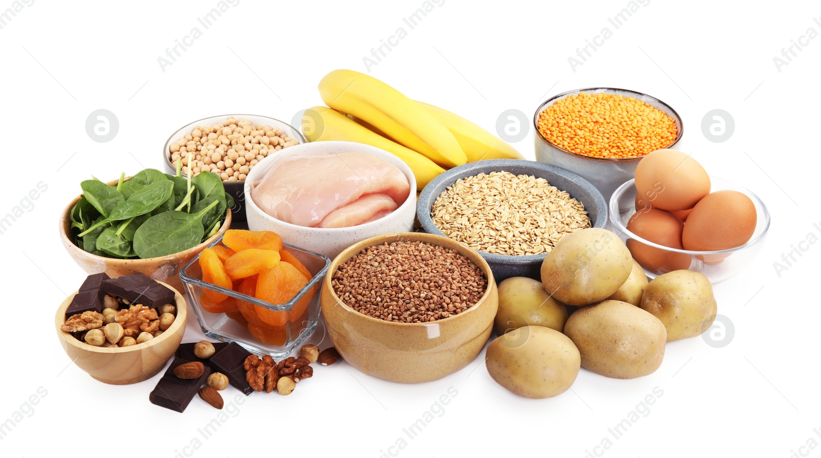 Photo of Different products rich in iron on white background. Anemia diet plan