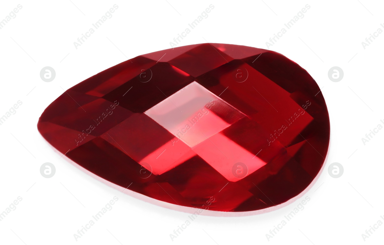 Photo of One red shiny gemstone isolated on white