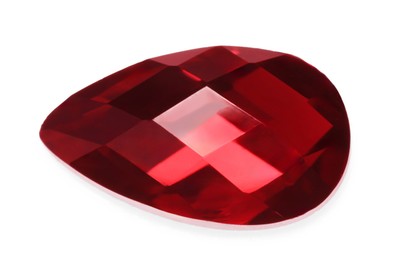 Photo of One red shiny gemstone isolated on white