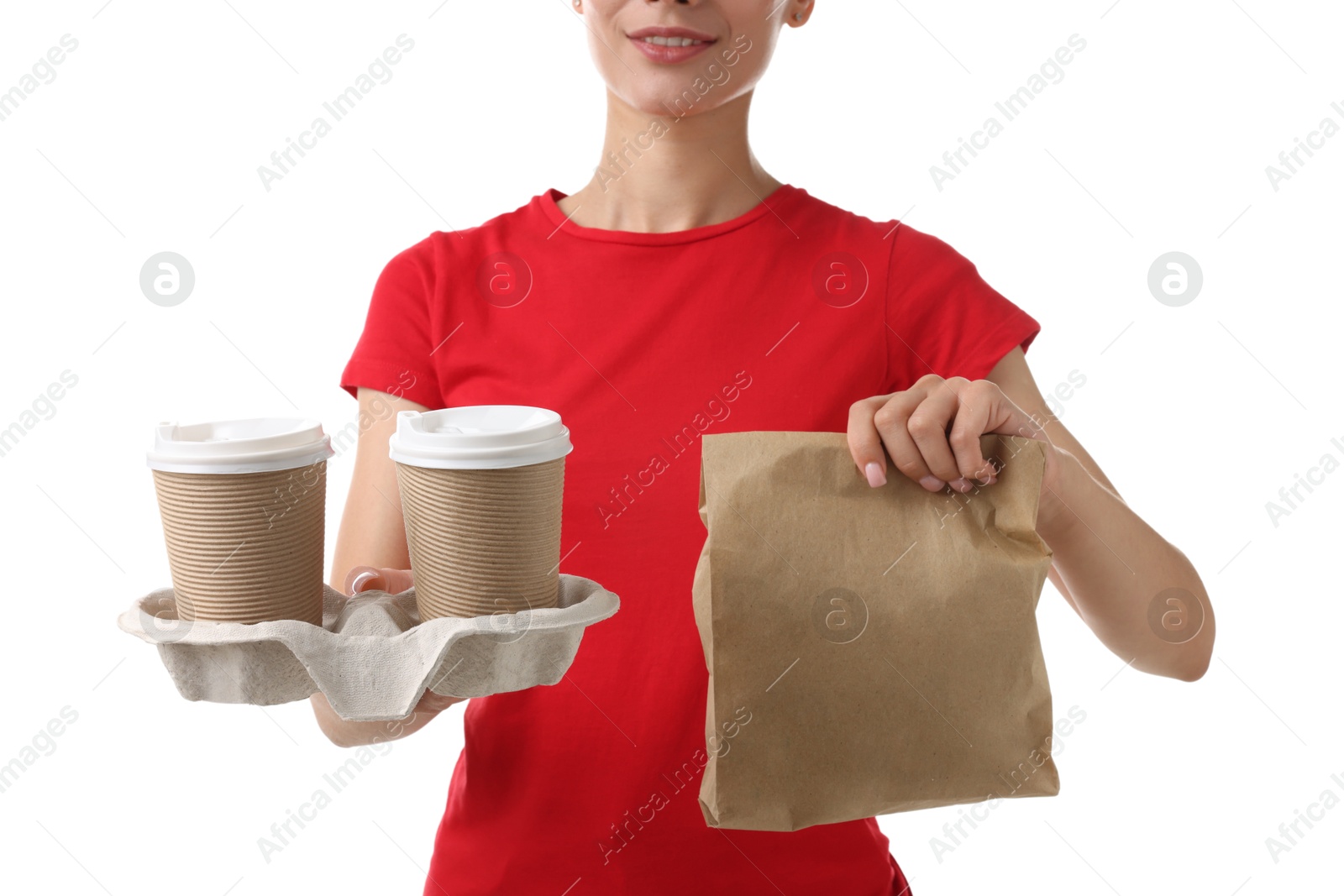 Photo of Fast-food worker with paper cups and bag on white background, closeup