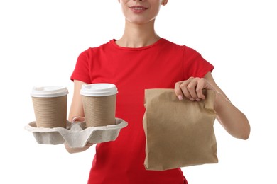 Photo of Fast-food worker with paper cups and bag on white background, closeup