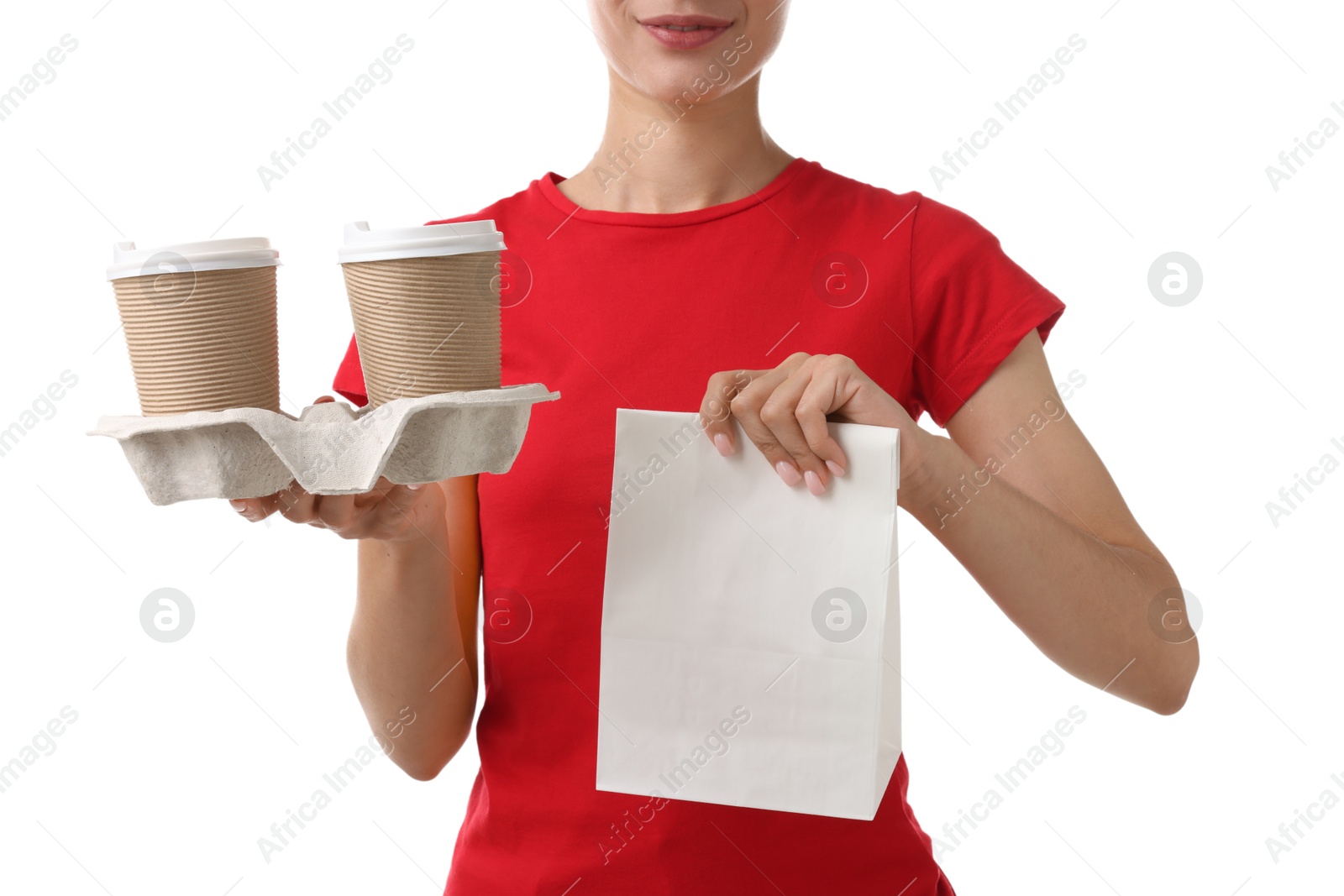 Photo of Fast-food worker with paper cups and bag on white background, closeup