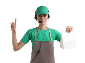 Photo of Fast-food worker with paper bag on white background