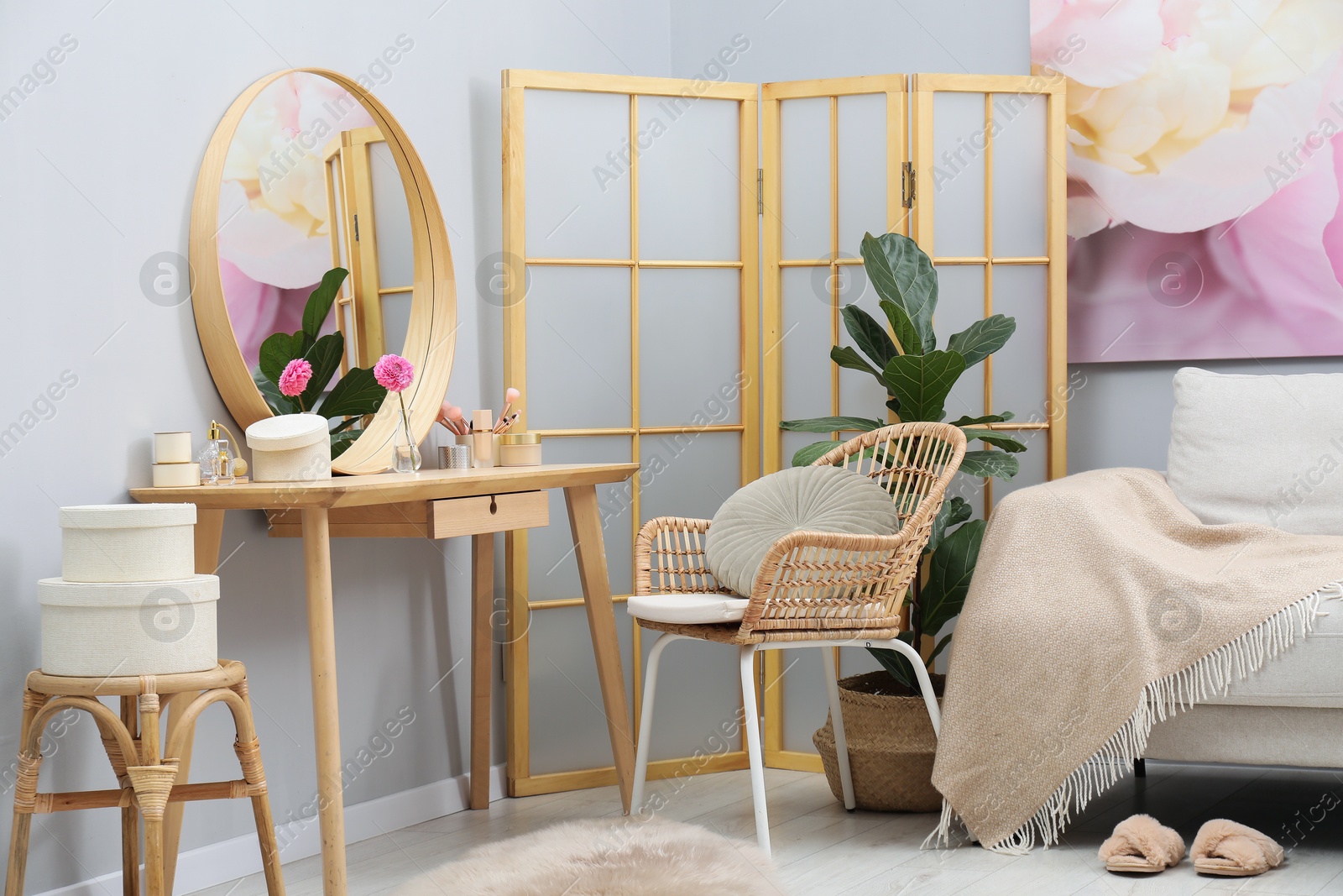 Photo of Mirror, dressing table, houseplant, folding screen and chair indoors. Interior design