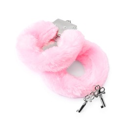 Photo of Pink fluffy handcuffs and keys isolated on white. Sex toy