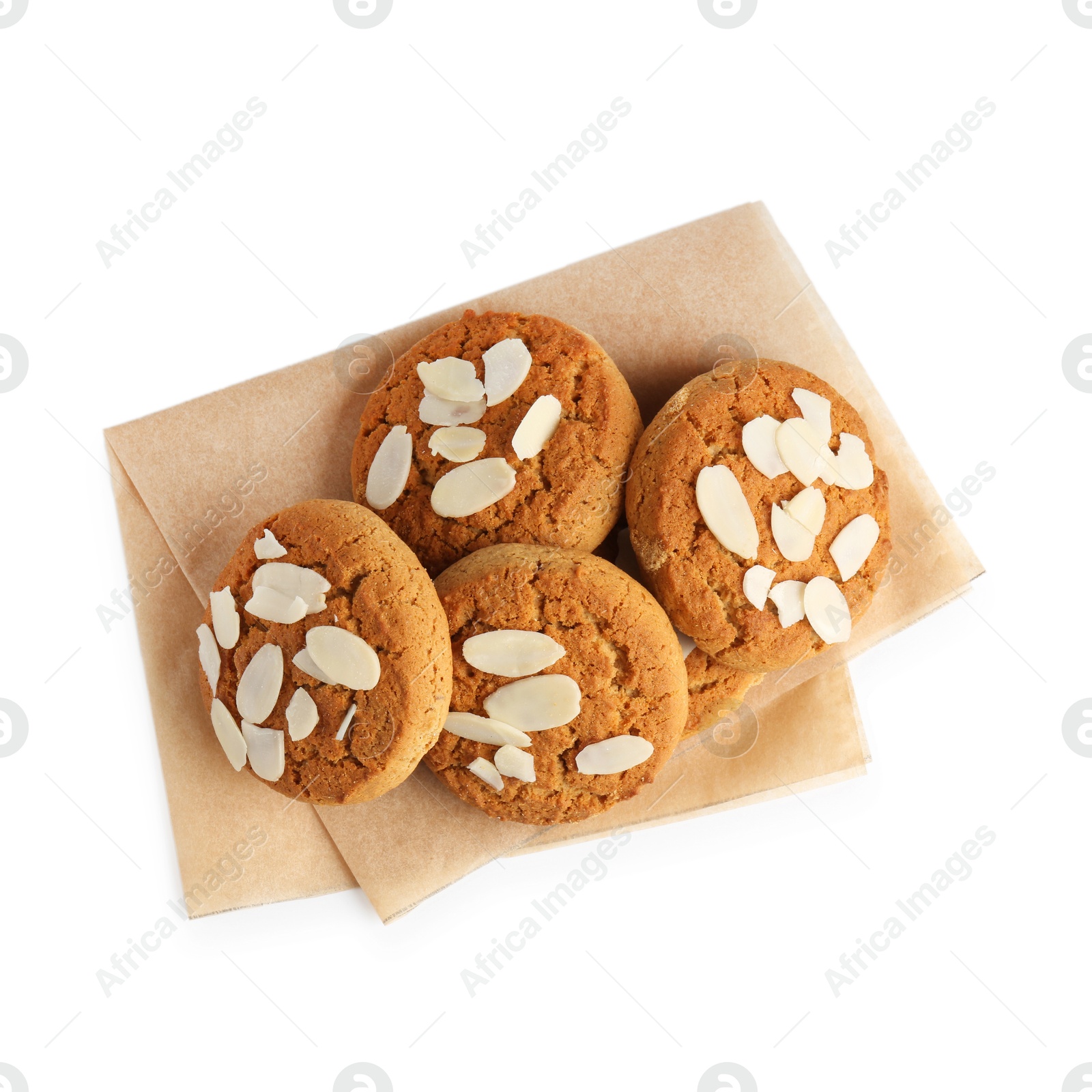 Photo of Tasty cookies with almond flakes isolated on white, top view