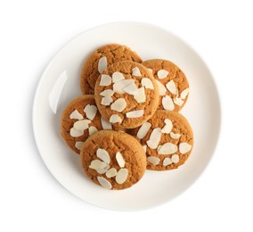 Photo of Tasty cookies with almond flakes isolated on white, top view