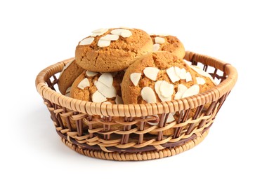 Photo of Tasty cookies with almond flakes in wicker basket isolated on white