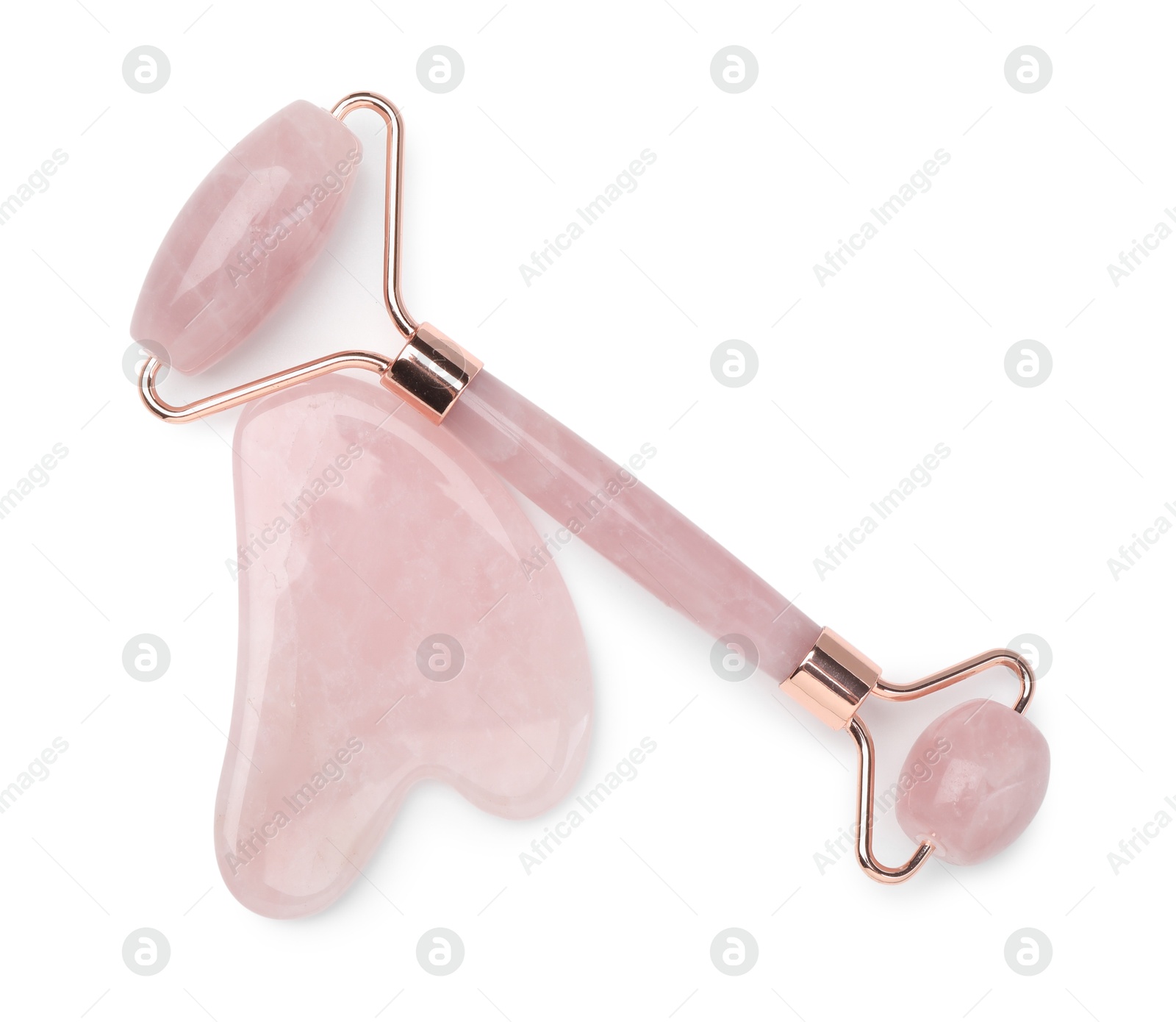 Photo of Face roller and gua sha tool isolated on white, top view