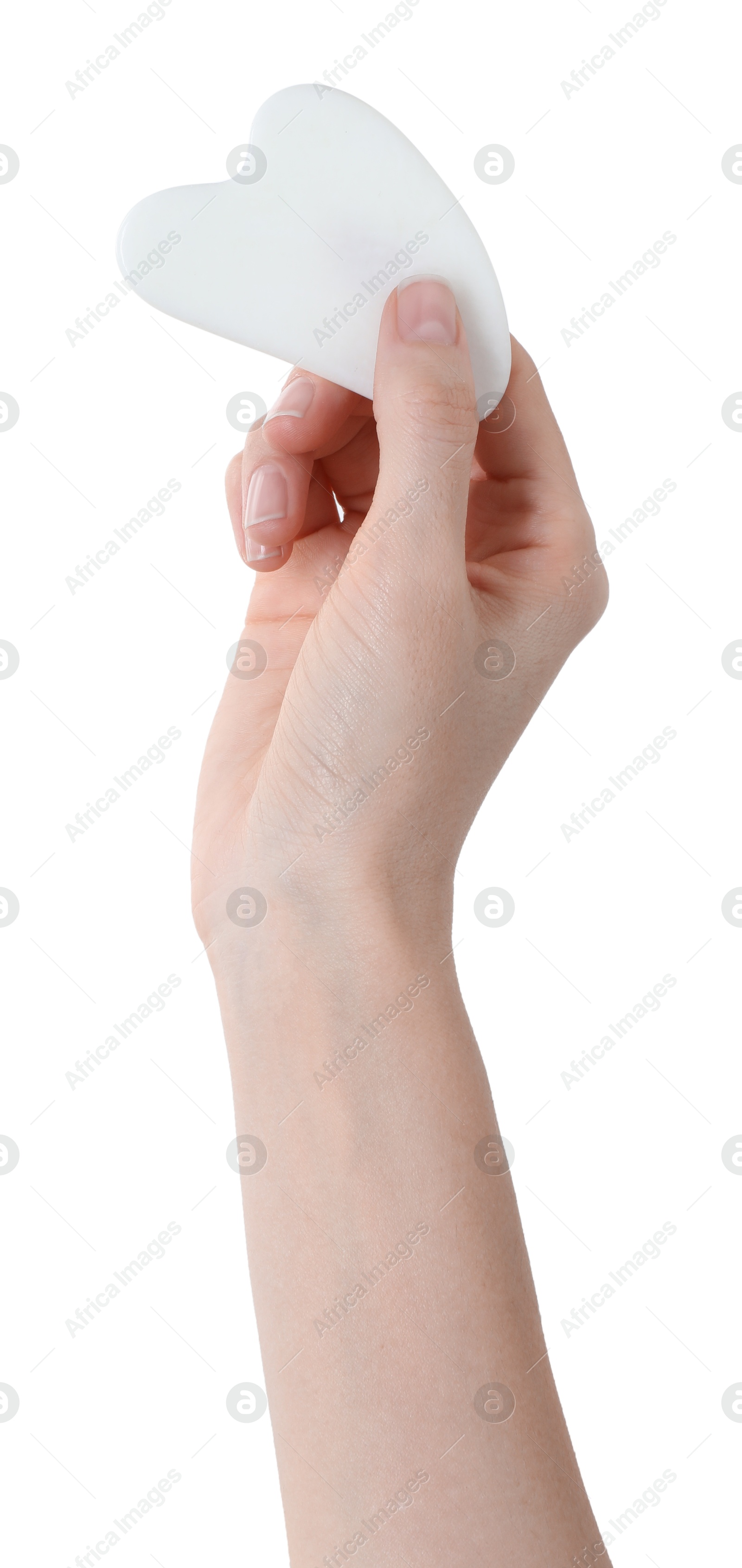 Photo of Woman holding gua sha tool on white background, closeup