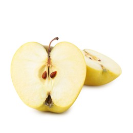 Halves of ripe yellow apple isolated on white