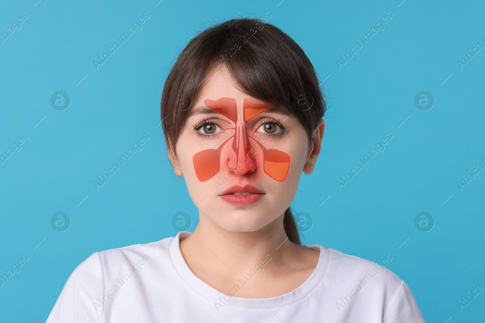 Image of Woman suffering from sinusitis on light blue background. Illustration on her face showing disease