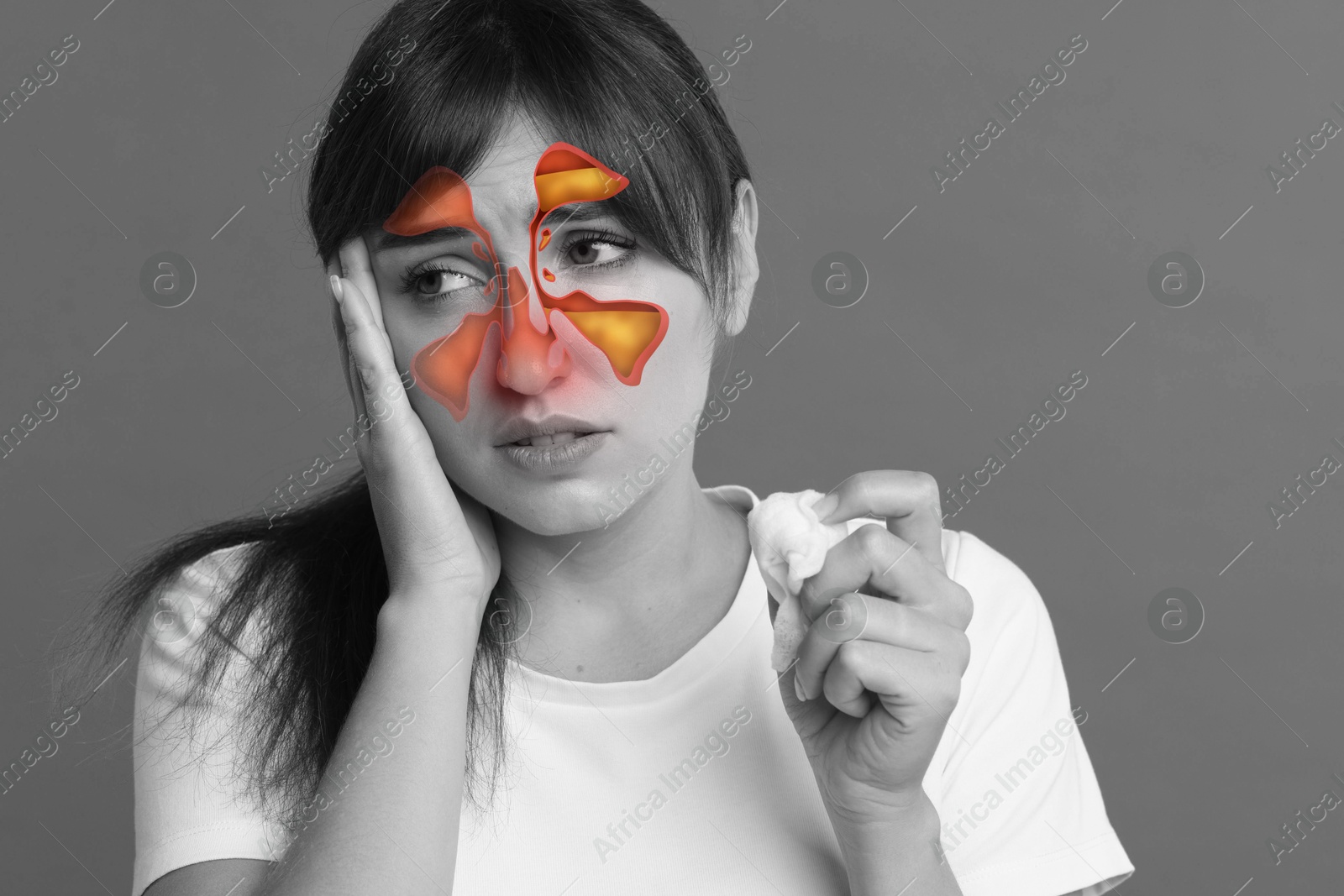 Image of Woman suffering from sinusitis, black and white effect. Illustration on her face showing disease