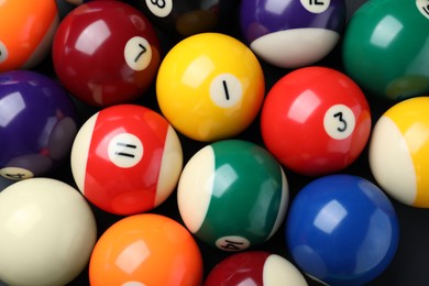 Photo of Many colorful billiard balls as background, top view