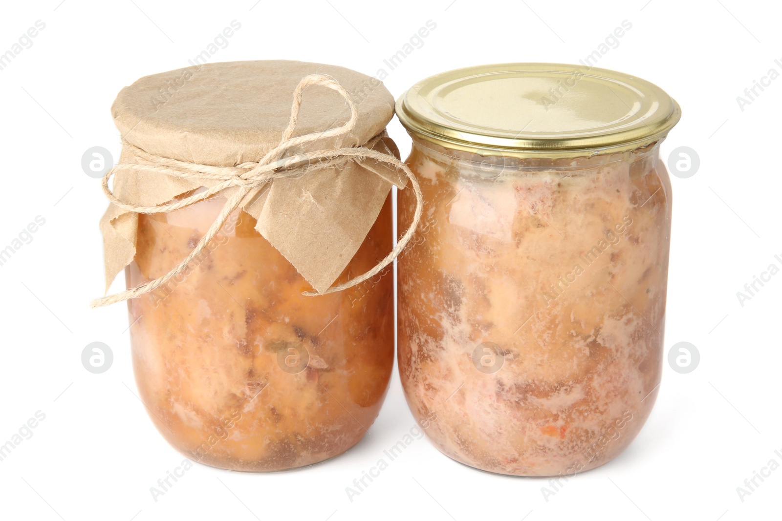 Photo of Canned meat in glass jars isolated on white