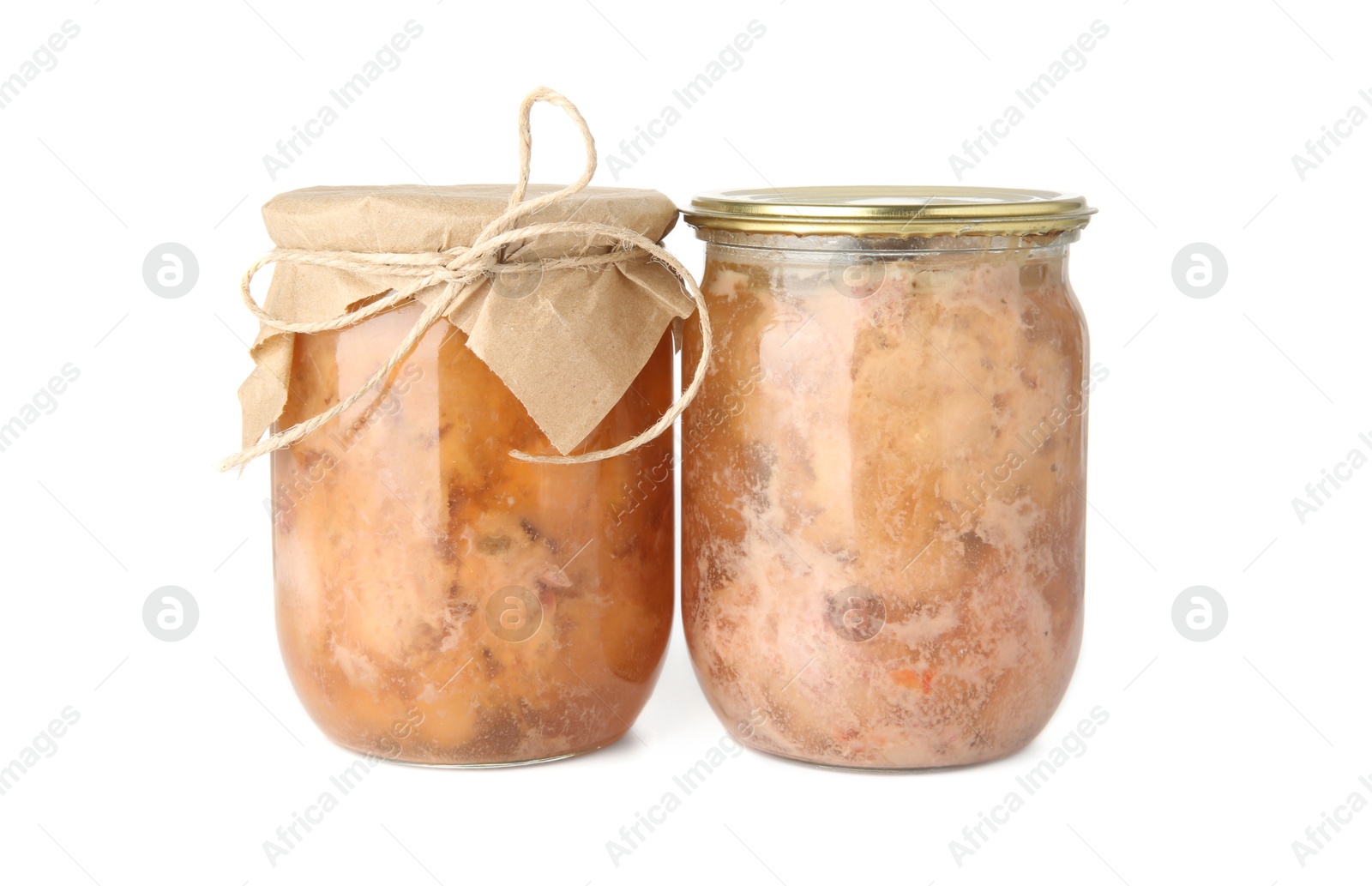 Photo of Canned meat in glass jars isolated on white