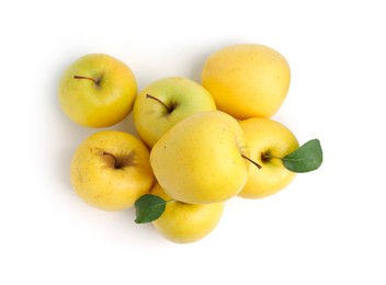 Photo of Many fresh yellow apples isolated on white, top view