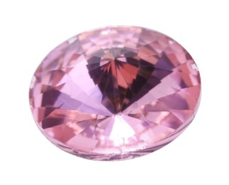 Photo of One pink shiny gemstone isolated on white