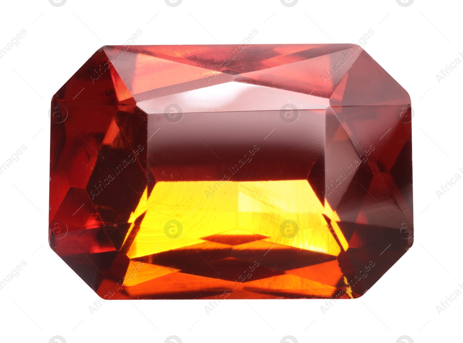 Photo of One red shiny gemstone isolated on white