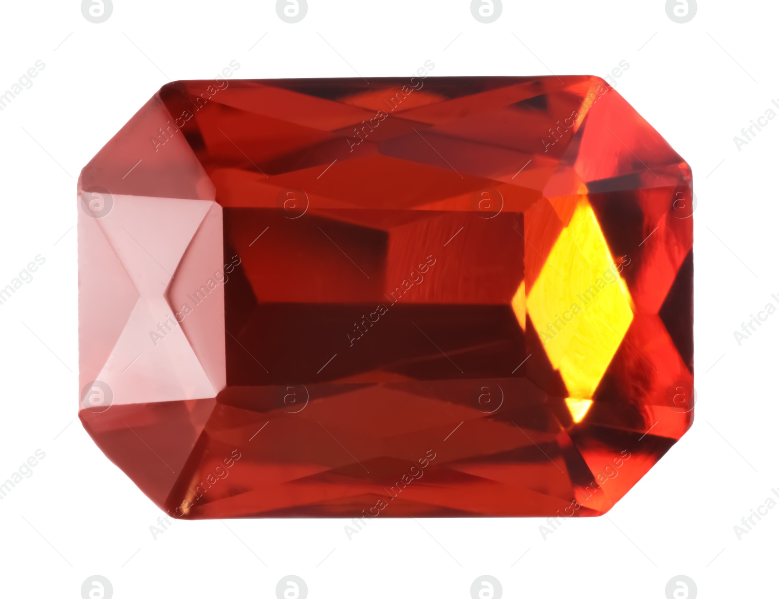 Photo of One red shiny gemstone isolated on white