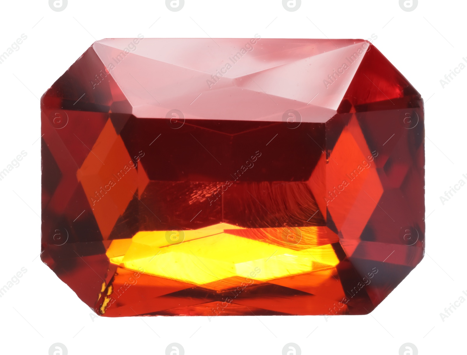 Photo of One red shiny gemstone isolated on white