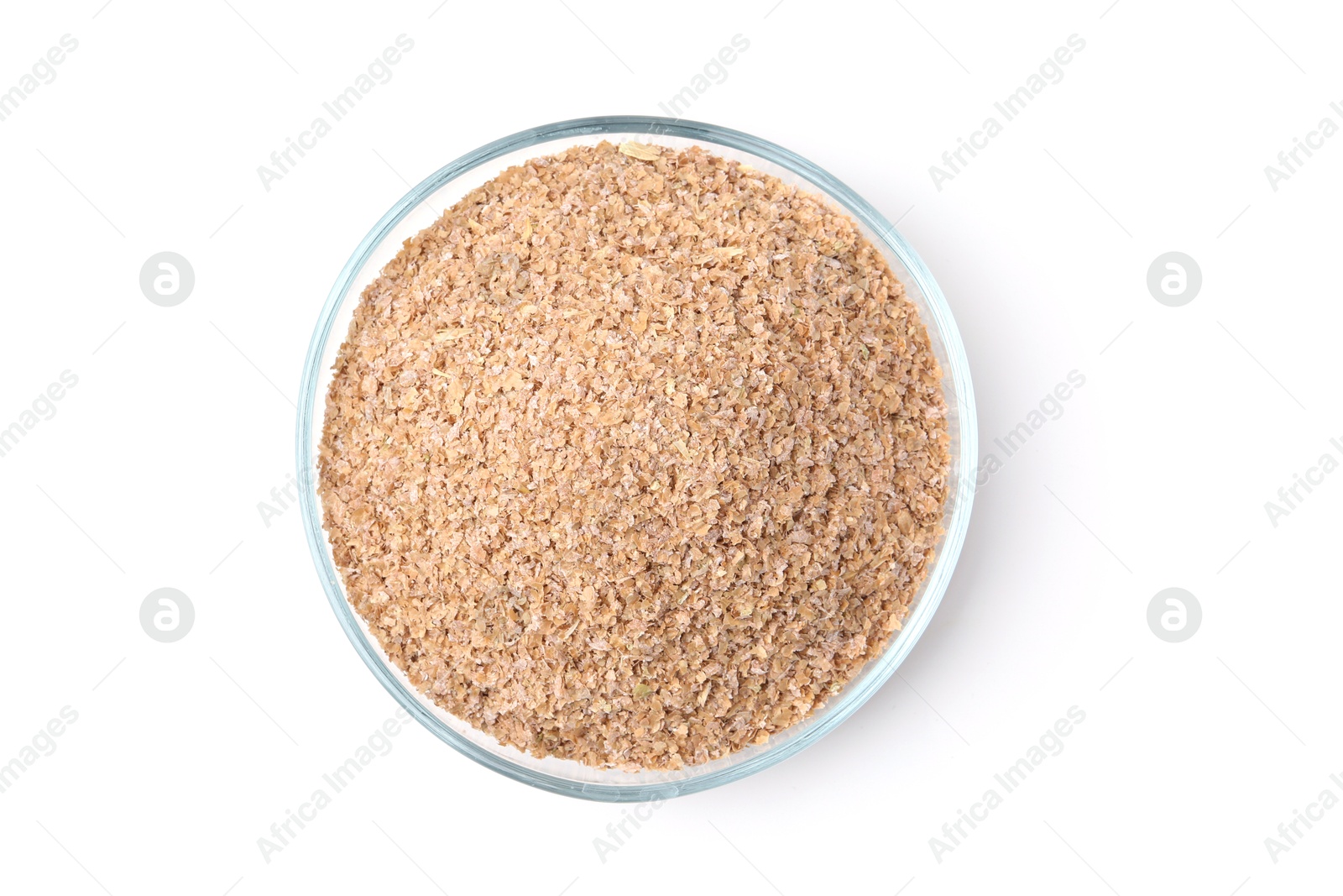 Photo of Buckwheat bran in glass bowl isolated on white, top view